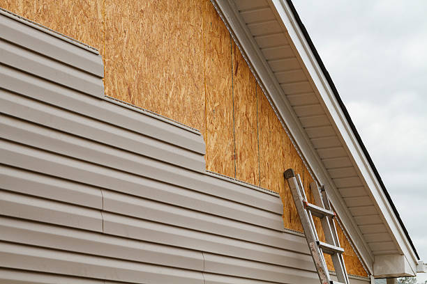 Professional Siding Installation technician working in Aultman, PA